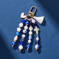 Holy Water Bracelets cross key chain/bag charm