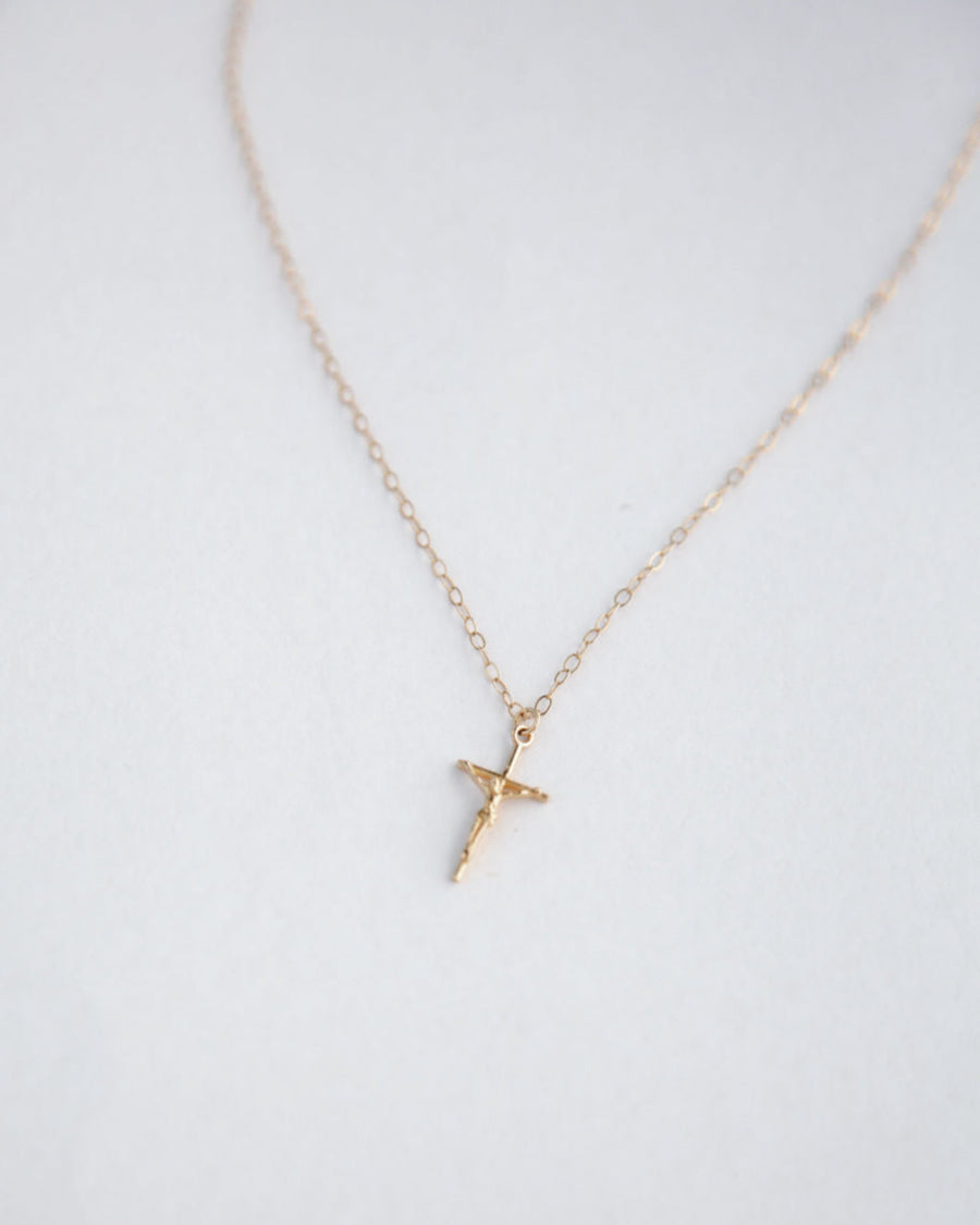 Dainty gold cross necklace
